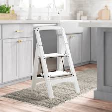 Here is a two step stool that also features folding construction. Wfx Utility Wood Series 2 Step Wood Step Stool With 225 Lb Load Capacity Reviews Wayfair