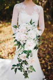 We only use the most realistic silk & real touch flowers available to make our wedding bouquets. Wedding Bouquet Bridal Bouquet Silk Wedding Flowers Wedding Etsy In 2020 Cascading Wedding Bouquets Silk Flowers Wedding Wedding Bouquets Sets