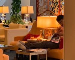 Image of Putting their feet on furniture