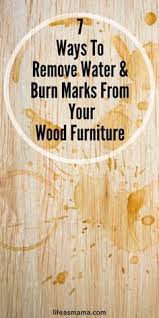 Here's a method to try on lacquered wooden surfaces only: 7 Ways To Remove Water Stains Burn Marks From Your Wood Furniture Burn Marks Diy Hanging Shelves Wood Furniture