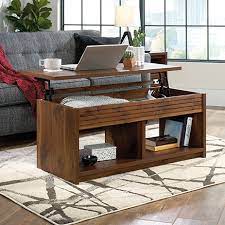 They not only serve the purpose of holding your cup of coffee while you watch television but also offer a perfect place for you to keep the assembly is required for the table for which the instructions are provided. Harvey Park Lift Top Coffee Table Grand Walnut 426504 Sauder Sauder Woodworking