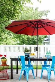Lowe S Spring Makeover Patio Reveal Emily A Clark Colorful Patio Red Patio Patio Decor