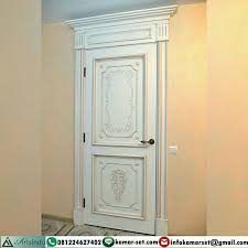 Dilengkapi dengan engsel yang simpel, rumah dengan pintu kelebihan dari pintu yang satu ini adalah dapat membuat rumah terlihat minimalis namun tetap elegan dengan sedikit aksen kayu. Desain Pintu Depan Rumah Minimalis Gambar Model Pintu Desainer Interior Indonesia
