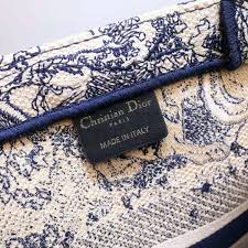 Does anyone have any advice between these two? Dior Unisex Small Dior Book Tote Blue Toile De Jouy Embroidery Lulux