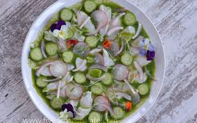 The most classic version is made with fresh raw shrimp, cucumber, red onion, lime juice, and chilies (typically serranos or jalapeños) that have been pulverized with some water—hence the name. Black Bass Aguachile Five Senses Palate