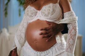 Latto Announces Pregnancy on New Album Cover, Shows Off Her Bare Bump in  Video