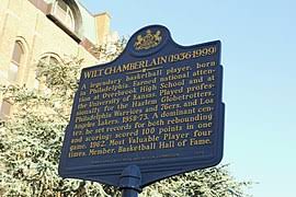 More than 7 feet (2.1 metres) tall. Wilt Chamberlain Wikipedia