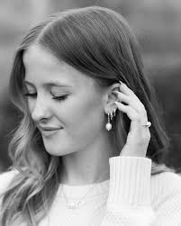 Let me tell you about Isabel's Senior session, which is TRULY one for the  books. 👇🏻⁣ ⁣ Amidst a busy day of Homecoming celebrations in Dayton, we  braved the crowds at Wegerzen