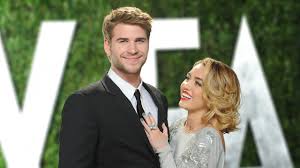 Congrats to miley and liam ! Miley Cyrus Shares Throwback Pic Of Her Kissing Liam Hemsworth Teen Vogue