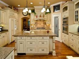 Black cabinets can be beautiful for kitchens. 15 White Antique Kitchen Designs That Abound With Warmth Charm Antique White Kitchen Cabinets White Kitchen Cabinets Diy Distressed Kitchen