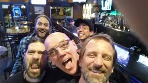 Typical NAMM day after a typical NAMM night. Pat Patrick DeRemer, David  Maki, Bongo John Haga and Don Wozniak. About '85 or '86?