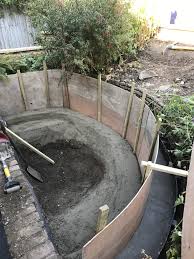 The floor and sides of the pond are formed by a fairly thin continuous concrete shell, which is lightly. Small Crescent Fish Pond Maltby Aquatics Pond Aquarium Design And Maintenance