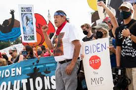 Biden Urged to Respond to Manchin by ...