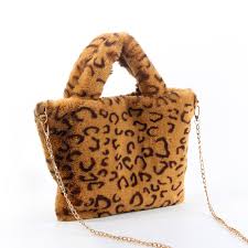 Emily has designed and handmade a stunning cushion collection, exclusively for covet, mixing her signature tropical florals with animal print and sumptuous velvet. 15 Years Factory Supply Designer Leopard Print Plush Skin Winter Bags Women Big Purses Handbags Buy Plush Bags Plush Designer Bags Big Purse Bags Women Product On Alibaba Com