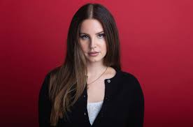 Vocalist who makes atmospheric orchestral pop showcasing her torchy image and sensuously husky singing style. Lana Del Rey Shines In A Floral Swimsuit On Her Birthday Sharing A Photo With A Look Alike Cake Florida News Times