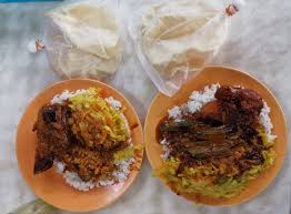 Nasi kandar is a iconic food synonymous with penang island, malaysia. Nasi Kandar Que Corner