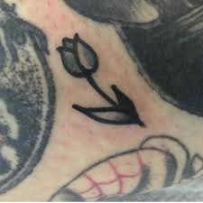 Small Black Traditional Tulip Tattoo By Jeroen Van Dijk Traditional Tattoo Tulip Tattoo Small Traditional Tattoo