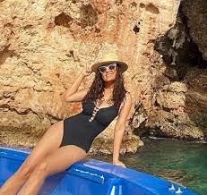 Admin april 14, 2020 1. Salma Hayek 53 Stuns In Black Swimsuit On Tropical Getaway
