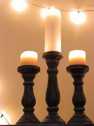 The candle holders feature textured black ceramic grooved bases topped with. Vintage Style Black Wooden Candlesticks Pillar Candle Holders 10 And 13