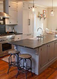 Thinking of putting either edison lights or smaller wattage to show the glass globe off better. Top 10 Kitchen Island Lighting Jarrett Design