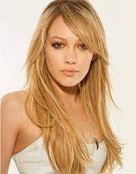 Medium layered haircut with long side bangs. Beautiful Bangs For Long Hair Pretty Designs