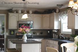 Kitchen Cabinet Topper Ideas Video And Photos Madlonsbigbear For Kitchen Ca Kitchen Cabinets Decor Decorating Above Kitchen Cabinets Above Kitchen Cabinets