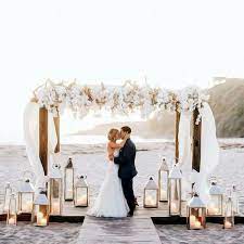 If your venue is a windy one, do without fabric laden arches. 19 Charming Beach And Coastal Wedding Arch Ideas For 2018 Elegantweddinginvites Com Blog