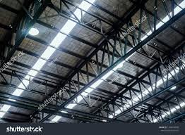 Roof Steel Beam Structure In Industrial Factory Background Of Factory Ceiling With One Light Blub Abstract Backgroun In 2020 Steel Roofing Beam Structure Steel Beams