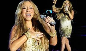 Mariah Carey dazzles on stage as her sister, a former prostitute and drug  addict, asks her to get in touch | Daily Mail Online