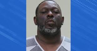 Mason City man arrested after drugs and guns found at his apartment