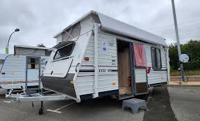 Image result for Teal 1993 Caravan