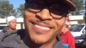 T.I. brings Christmas cheer to halfway house where he was once in custody