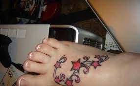 Pixie Lott Hot Photos Star Tattoo Designs Star Tattoo Designs Foot Tattoos Neck Tattoo
