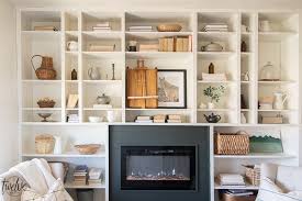 Shop electric fireplaces to warm your home and add ambiance, available in a variety of styles. Gorgeous Office Bookshelves With A Built In Electric Fireplace Twelve On Main