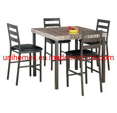 It acts not only as a great breakfast bar but an easy island for dinner prep and cookie decorating as well! China 5 Piece Kitchen Counter Height Table Set Industrial Dining Table With 4 Chairs Modern Counter Height Pub Table For Compact Space China Dining Table Set Dining Room Sets