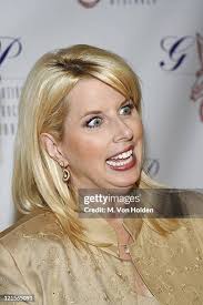 Mark Eicher and wife during Denise Rich and the G&P Foundation for... News  Photo