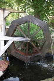 The pond boss 1/4 hp floating fountain with lights aerates the water with a beautiful fountain and illuminates the fountain at night. Small Ponds And Fountains Water Wheel Custom Ponds