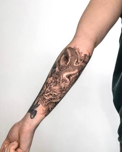 Dragon's eye after 11 hours - 1.5 sessions Outer sleeve project . . #dragon #eye #realismtattoo #blackandgreytattoos #yegtattoo