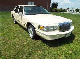 Image result for Light Prairie Tan 1997 Town Car