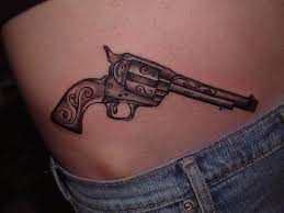 Explore the top 51 best gun tattoos featuring revolvers, rifles, pistols, and bears packing heat. 45 Amazing Gun Tattoo Designs