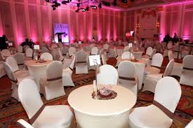 Corporate Event Table Setup With Spandex Table Cover And White Spandex Chair Cover From Sculptware