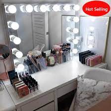 Vanity models not only possess a mirror and plenty of space to store and arrange products, but also a seat for you to comfortably sit. China Hollywood Light Makeup Vanity Mirror Dressing Table Mirror China Led Bathroom Mirror Wall Mirror