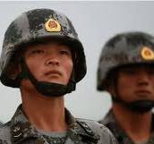 Do modern Chinese troops still use the red star helmets or ...