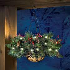 The Cordless Hanging Holiday Pinecone And Berry Basket Hammacher Schlemmer Wish I Only Need Christmas Hanging Baskets Christmas Centerpieces Christmas Pots