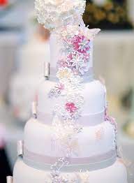 This is a gorgeous cake outfitted with silver sequins, ruffles and flowers. 9 Romantic Butterfly Wedding Cakes That Will Give You Butterflies