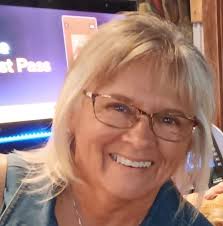 Who's dat behind Mike Schouest & Connie Schouest?