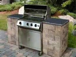 You build this with decorative concrete rings and then just your grill area to the center. How To Build A Bbq Grilling Station Or Grill Surround Outdoor Barbeque Outdoor Grill Station Built In Bbq