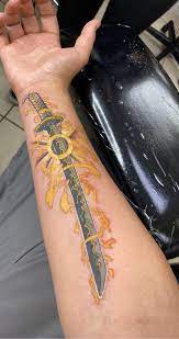 Zenitsu sword tattoo