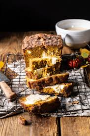 Cream Cheese Swirled Pumpkin Bread With Salted Maple Butter Halfbakedharvest Com Easyrecipes Pumpki In 2020 Pumpkin Bread Recipe Pumpkin Bread Pumpkin Coffee Cakes