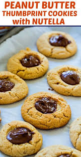 Peanut Butter Thumbprint Cookies With Nutella Spicy Southern Kitchen Recipe Peanut Butter Thumbprint Cookies Nutella Cookies Thumbprint Cookies